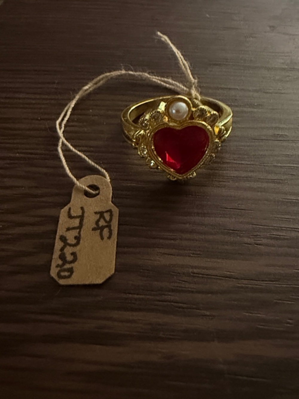 Gold-Tone Heart Ring with Red Gem and Pearl Accent